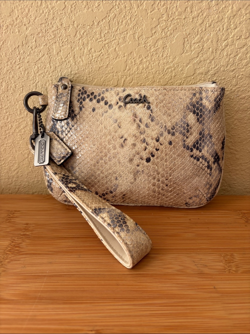 Coach Ivory and Black Embossed Python Wristlet